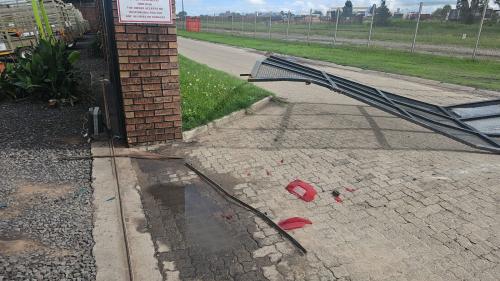 Gate destroyed by flagged vehicle 4
