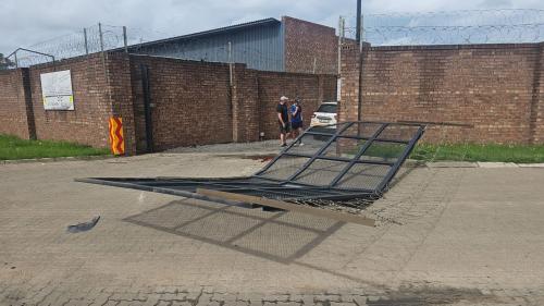 Gate destroyed by flagged vehicle 6
